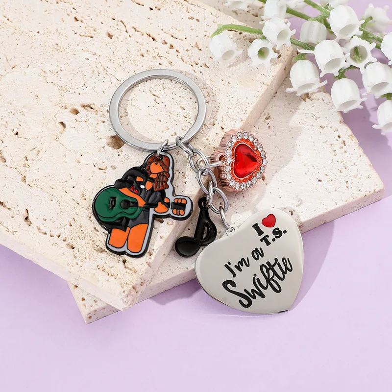 Breloczek Taylor dla fanów, ko – Women Bags Collection recenzja i cena